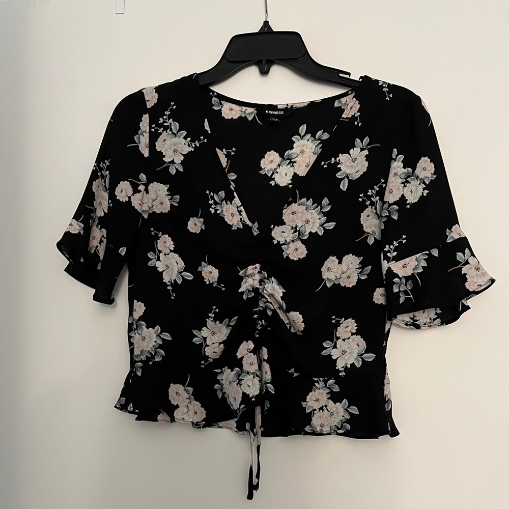 Express black floral slightly cropped top. 3/4 sleeve. Size XS. Great condition